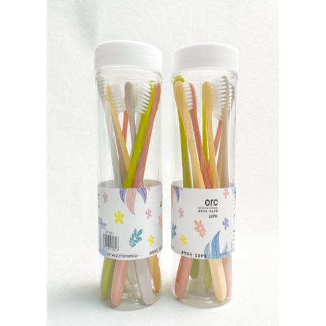 Toothbrush With Storage Bottle