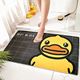 Small yellow duck floor rug