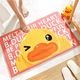 Small yellow duck floor rug