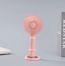 A handheld fan diffuses scents