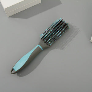 Gray turquoise hairbrush