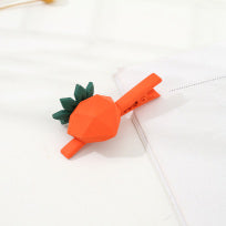 Carrot hair clip in a carrot design