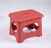 Small yellow folding stool