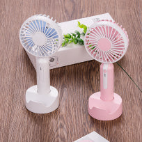 Desk fan with phone holder