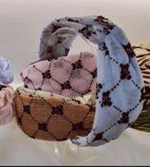 A Frutic Rhombus Arch