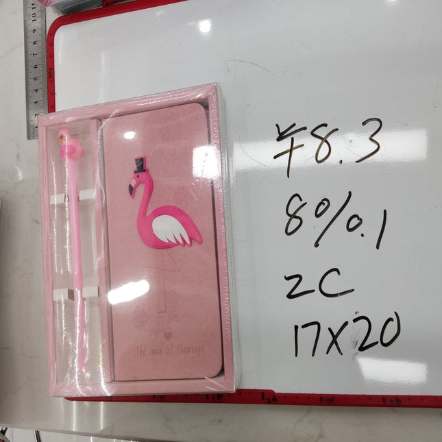 מחברת A5 עם עט